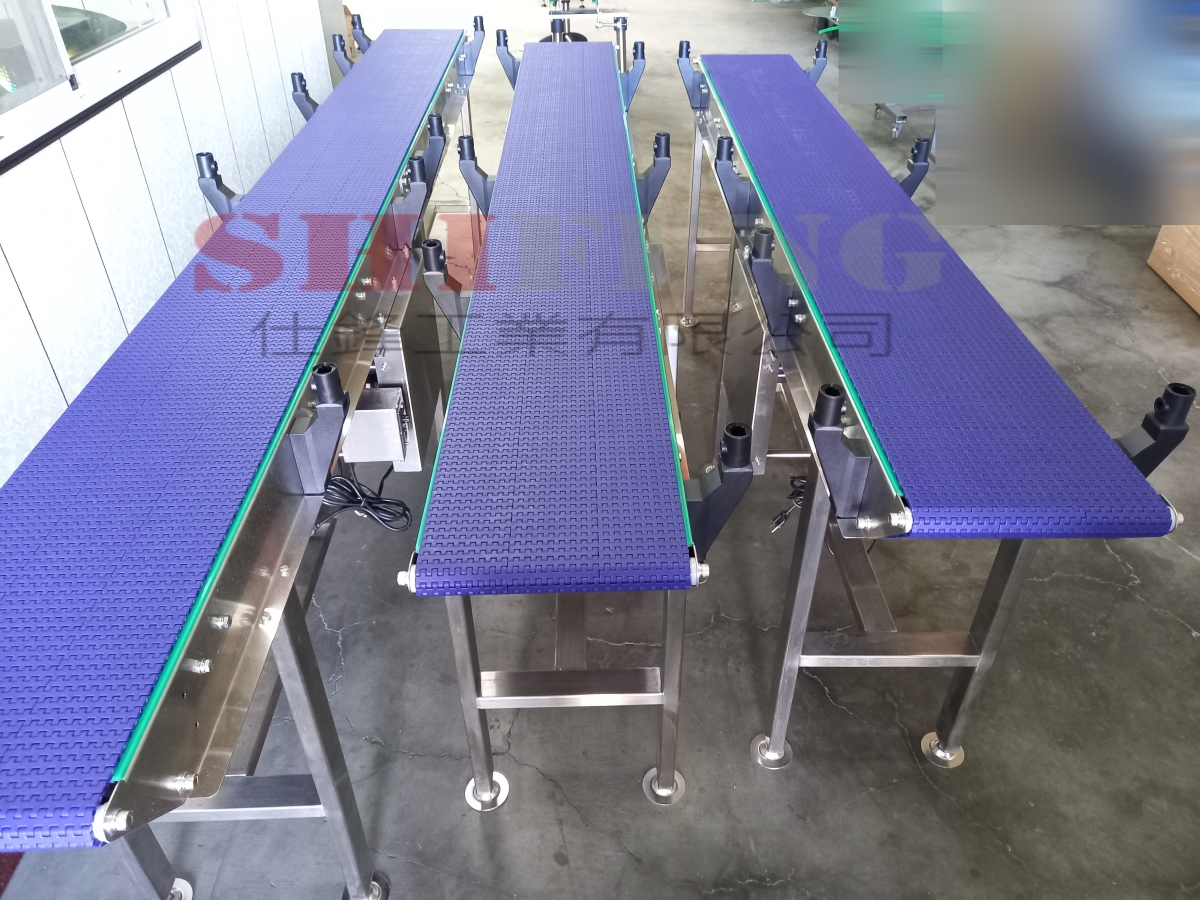 不銹鋼塑板帶雙刀嘴中傳式輸送機