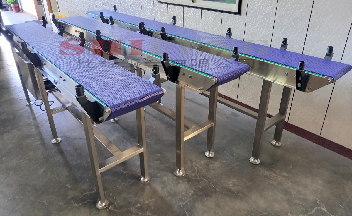 不銹鋼塑板帶雙刀嘴中傳式輸送機